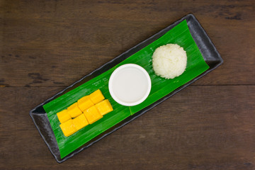 dessert sweet with sticky rice, mango and coconut cream