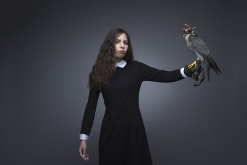 Girl and peregrine studio shooting