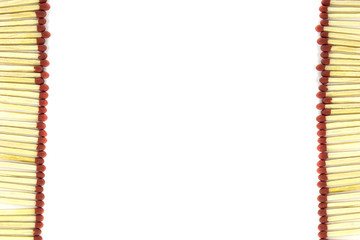 Two rows of matches on both sides  isolated on white background