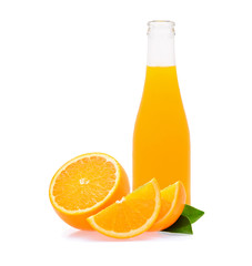 Citrus fruit with a bottle of orange juice