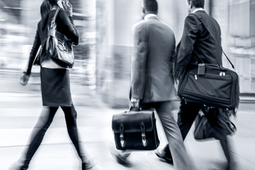 group of business people in the street in blue tonality