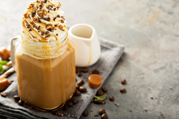 Caramel iced latte with whipped cream