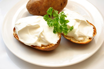 Baked Potato with Sour Cream and Fresh Parsley