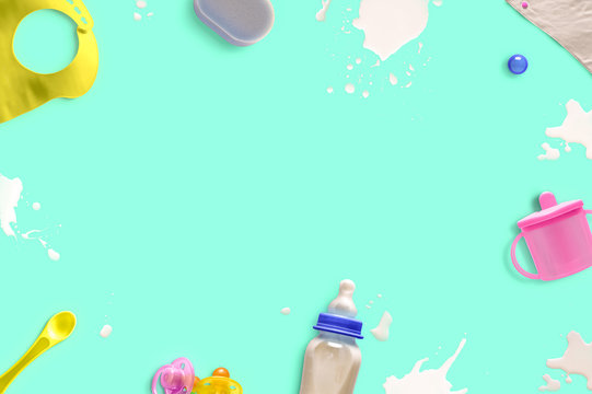 baby bottle-feed with milk splashes