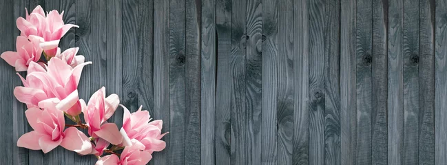 Foto auf Leinwand Background with magnolia flowers on wall of wooden planks © julia_arda