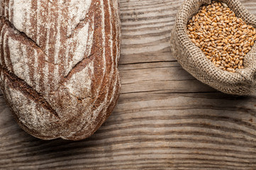 loaf of bread on wooden table