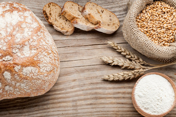 loaf of bread on wooden table