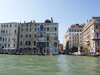 Fototapeta na wymiar Canal of Venice with buildings