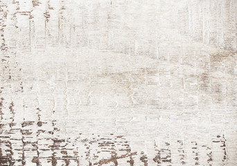 Natural wood background painted white with scuffs. Wooden texture