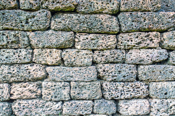 Old granite brick stone wall texture for background use