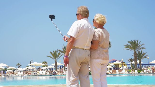 High quality video of senior couple taking a selfie in 4K Video series of senior couple on tropical vacation More videos from this series in my portfolio