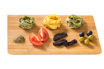 Ingredients for spaghetti / Italian cuisine of the white background