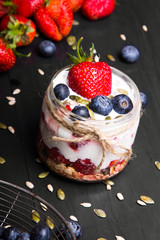 delicious dessert - yogurt with strawberries and blueberries