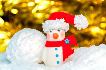 Snow man over blurred shiny yellow strip, and white background for Christmas new year decoration