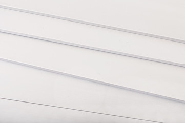 Abstract background of the metal aluminum strips.