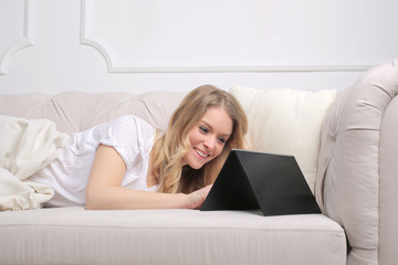 Using a laptop on the sofa