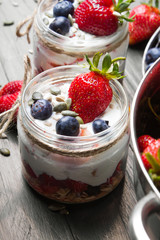 delicious dessert - yogurt with strawberries and blueberries