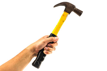 Man's hand holding old yellow hammer isolated over white. Photo includes clipping path