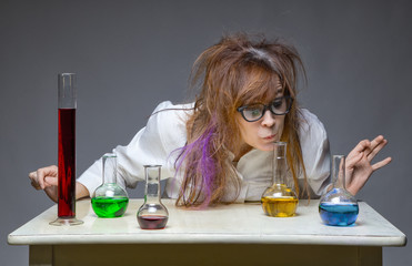 Sniffing shaggy scientist in lab