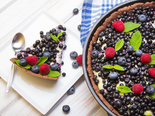 Delicious tart with blueberries and raspberries