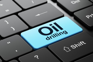 Industry concept: Oil Drilling on computer keyboard background