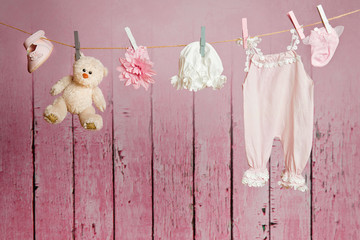 Baby clothes hanging on the clothesline
