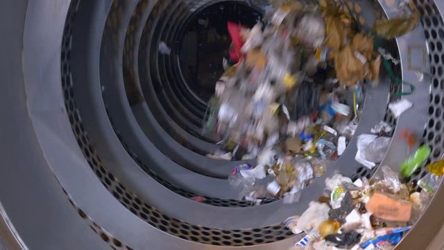 Garbage sorting machine on a waste recycling plant. 4K.