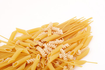 Various types of pasta on a white background.
