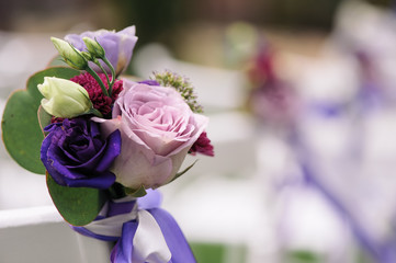 Close up of flower decorated on wedding chair