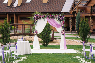 Wedding arch with nicely flower decoration