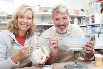 Mature Couple Enjoying Pottery Class Together