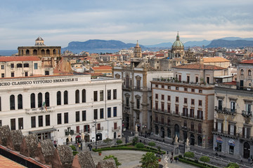 Fototapeta na wymiar PALERMO, ITALY – 03 January 2017: View from the roof of Palermo Cathedral in the old houses. Tyrrhenian sea in the background. Palermo. Sicily