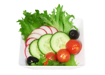 Salad of fresh vegetables In white cup on white background