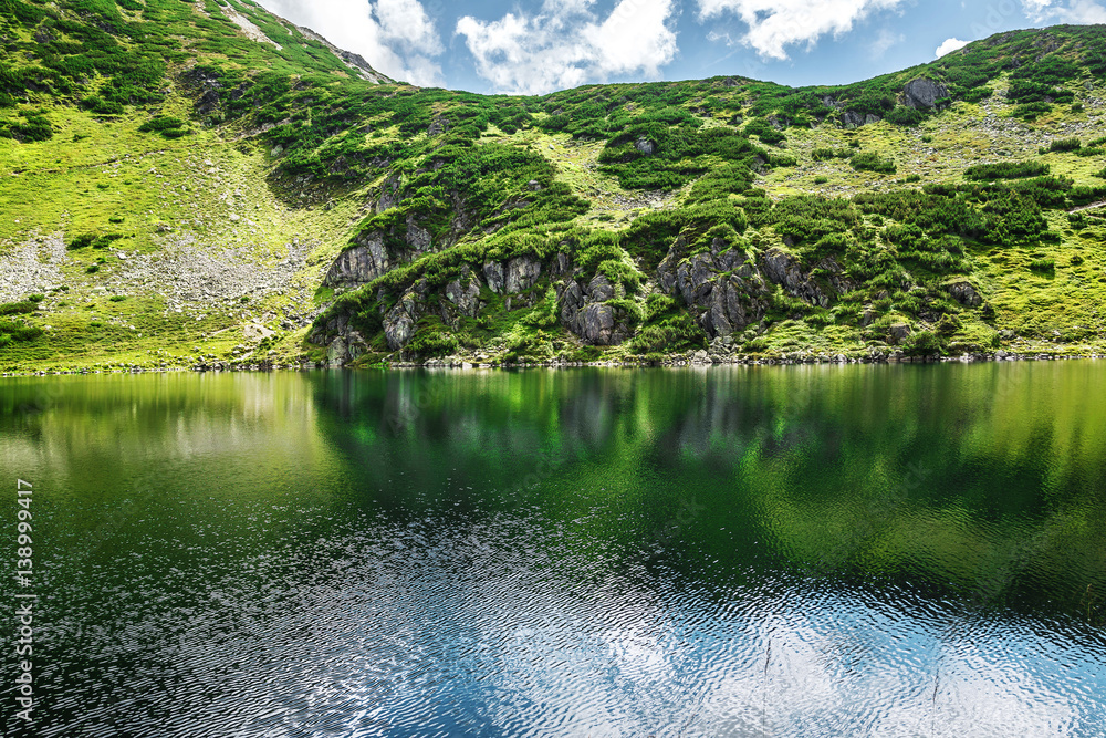 Wall mural  The Wildseeloder mountain reflected in Wildsee , area Kitzbüheler Alps ,Fieberbrunn, Tyrol, Austria