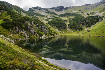 Fototapeta na wymiar The Wildseeloder mountain reflected in Wildsee , area Kitzbüheler Alps ,Fieberbrunn, Tyrol, Austria