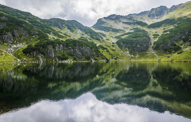 Obraz na płótnie Canvas The Wildseeloder mountain reflected in Wildsee , area Kitzbüheler Alps ,Fieberbrunn, Tyrol, Austria