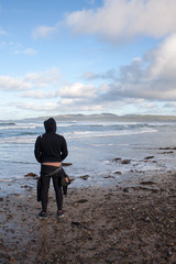 Surfer looking for waves Ireland