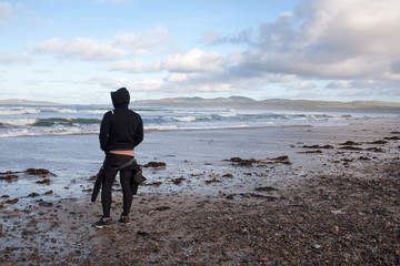 Surfer looking for waves Ireland
