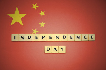 letters with text independence day on the national flag of china.