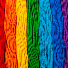 Colorful Embroidery Floss Background. Selective focus.
