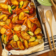 Homemade Roasted Sausages and Potato Dinner. Selective focus.