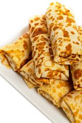 Russian Stuffed Blintzes Isolated on White. Selective focus.
