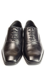 Classic black leather men's shoes isolated on white background.