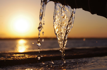 drops of water on a background of a beautiful sunset
