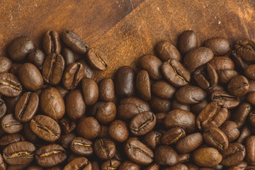 Brown coffee beans, closeup macro for background and texture