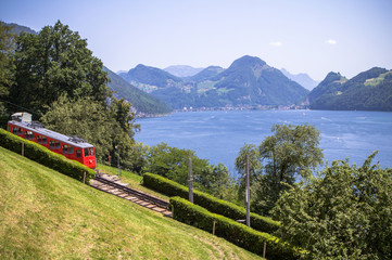 Fototapeta na wymiar Red cogwheel train in Lucerne, Switzerland