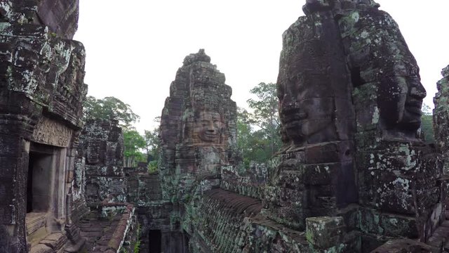 Ancient, Sculpted Stone Faces of Bayon Temple Ruin in Cambodia