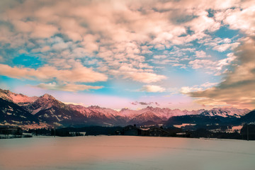 Fototapeta premium Winterlandschaft bei Sonnenuntergang in den Alpen