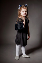 Girl with a black handbag