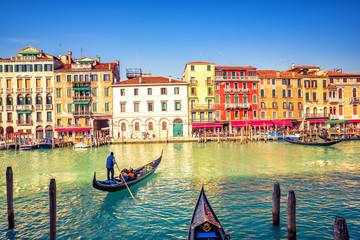 Fototapeta na wymiar Gondola on Grand canal in Venice, Italy